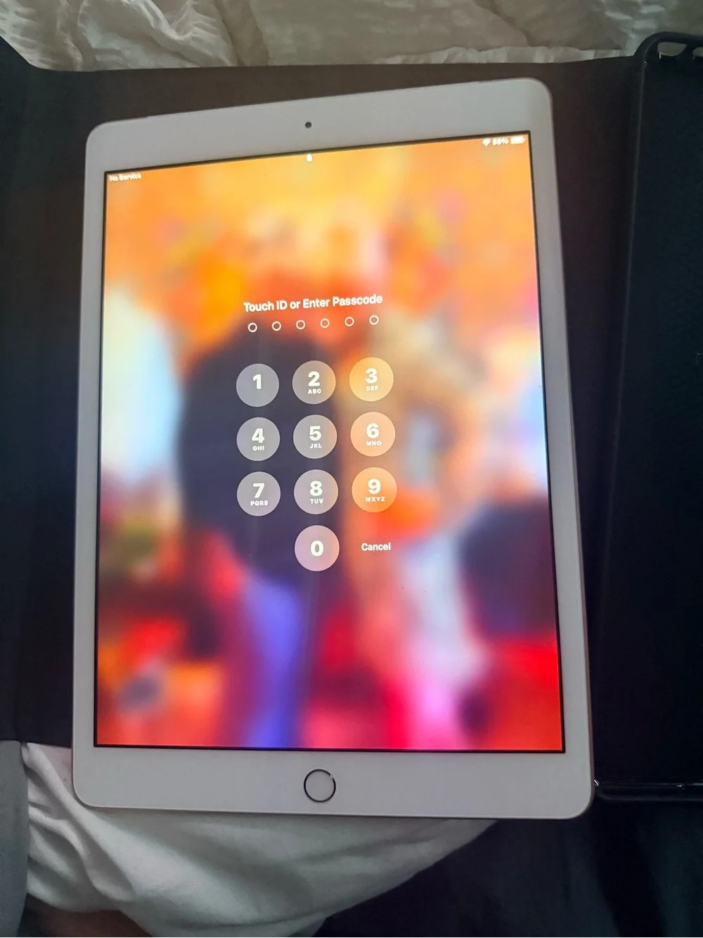 Apple White Tablet with Rainbow Hello Display